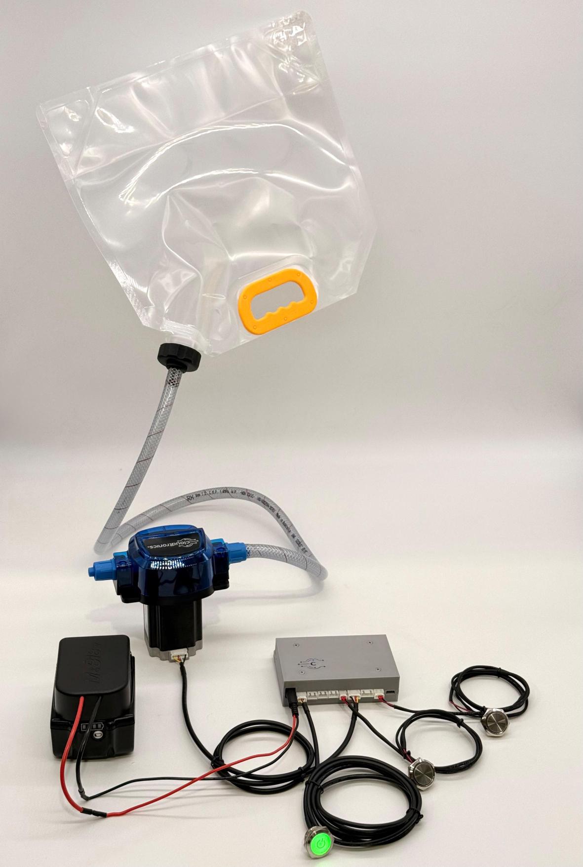 The full FluidMate Kit assembled and wired together,pouch, pump, control box, battery and buttons